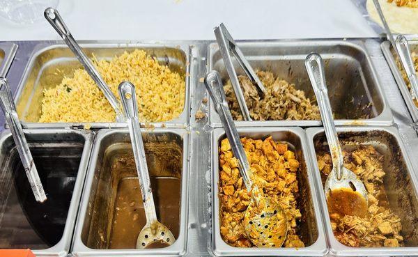 Steam table with rice, beans, proteins