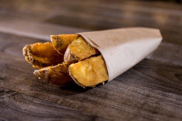 Our potato wedges are made fresh with a special blend of spices that we hand-dredge over freshly cut russet potatoes