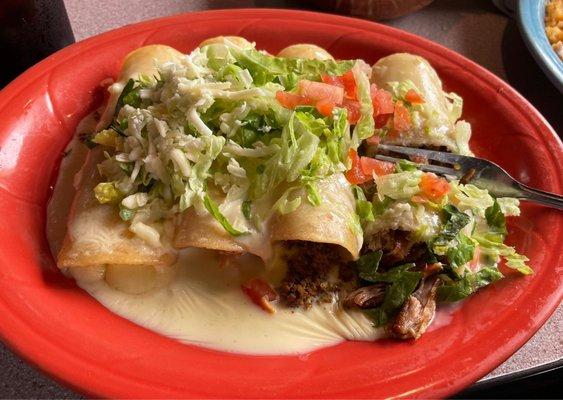 Enchiladas Supremas; four different tasty Enchiladas served w Rice & Beans (not in photo)