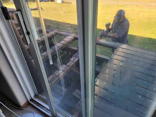 Jeff of Tad's crew removing the old deck