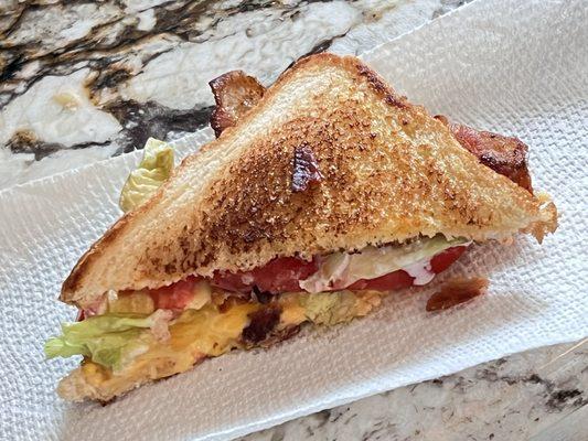 BEST SANDWICH!!   Tipton's Bacon, Egg, Cheese, Tomato & Lettuce, on grilled Toast; add Hash Browns on the side for a SHOW STOPPER. ***