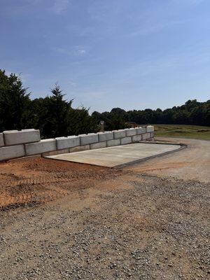 Needing concrete or large retaining walls? We can help you with that!