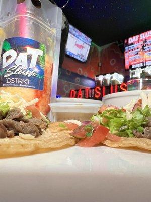 Steak tacos and spicy mango slushie pouch.