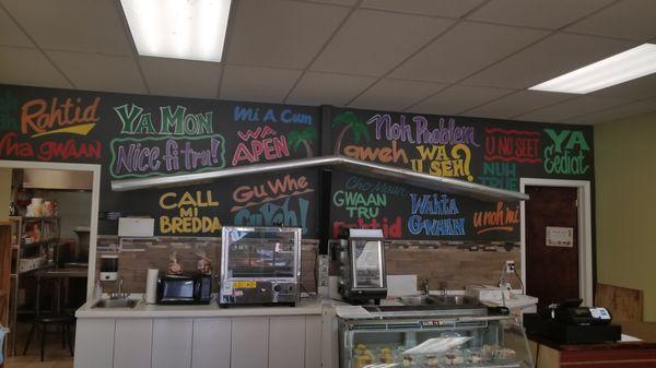 So many Jamaican sayings are displayed on this wall, just trying to say them will make you laugh...