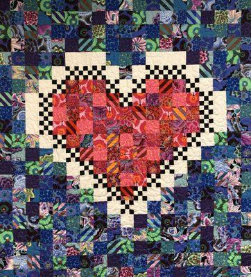 Heartfelt quilt pattern in 2 sizes available at www.quiltingdelights.com