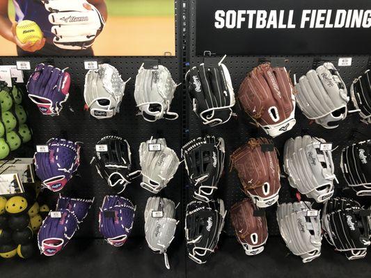 Youth softball mitts.