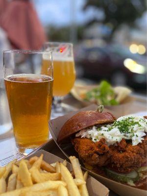 Fried chicken sandwich and beer