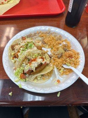 Fish tacos plate I had to add my own sauce to give it some what of a taste