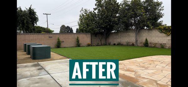 Turf, flagstone, veggie boxes