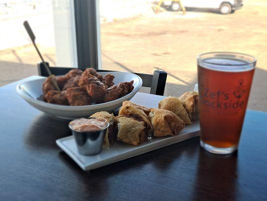 Boneless wings and corn beef and cheese eggrolls.