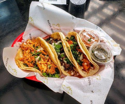 Three Taco Special - Gochujang Chicken, Bulgogi Beef and Gochujang Shrimp - at Nuevo Seoul