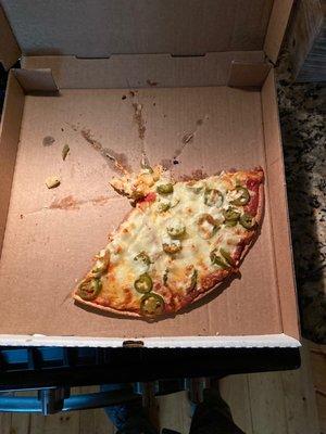 What's left of the large pineapple and jalapeño pizza.