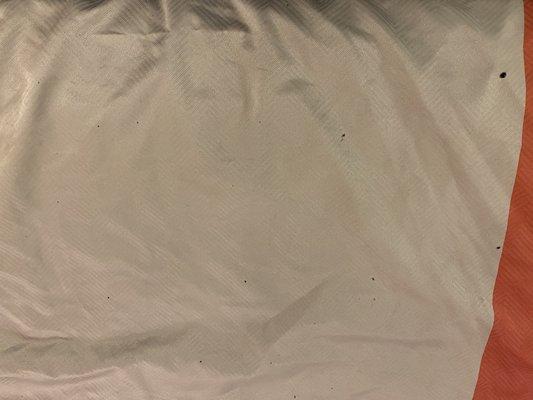 Blood and Cigarette burns all over comforter