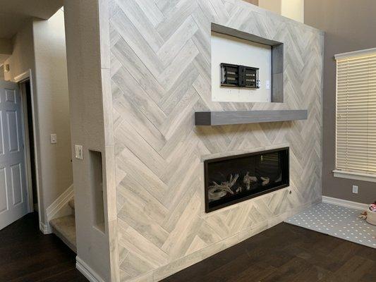 Modern tile for a lovely fireplace.