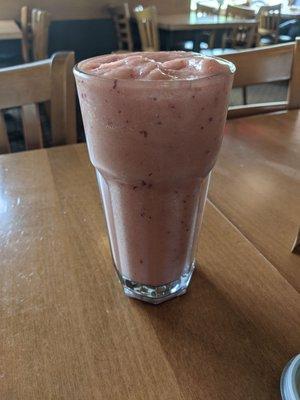 Fresh Fruit Smoothie with cantaloupe, honeydew, grape, pineapple, banana, strawberry, orange juice and honey.