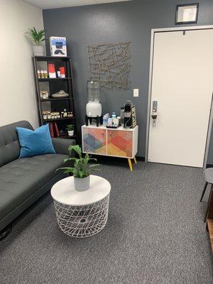 Our new  boutique style waiting room to relax you before your treatment.  Enjoy some water, coffee, or tea.