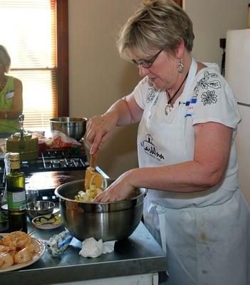 Chef Kris Larkin in the midst of a Cooking Class at The Lark Inn