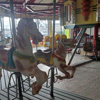 The bizarre, run down merry go round inside the B&I.