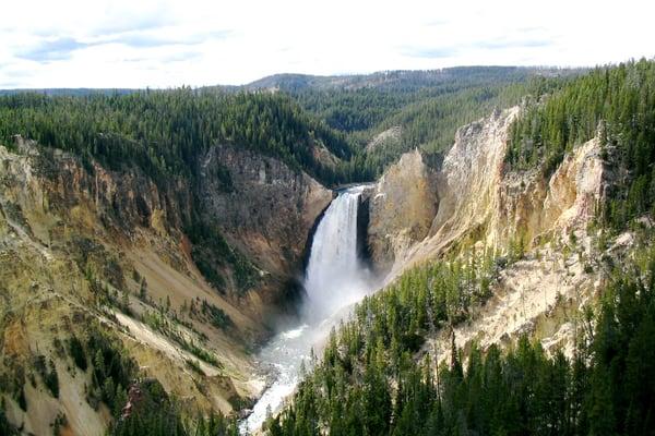 Beautiful waterfall view from Yellowstone National Park. Enjoy the view and comfort of our rental trailers at the same time.