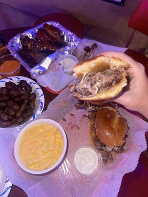 Steak sandwich, wings, boiled peanuts, Mac n cheese