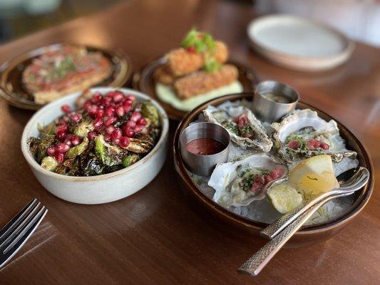 Brussel Sprouts, Croquettas, and Oysters.