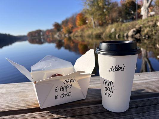 Coffee and donuts beside the river.