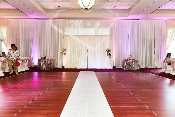 Beautiful arch/alter with drapes and string lights - exactly as I wanted them