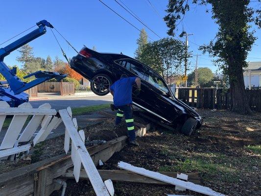 Carefully lifted car to make sure it did not damage sidewalk.