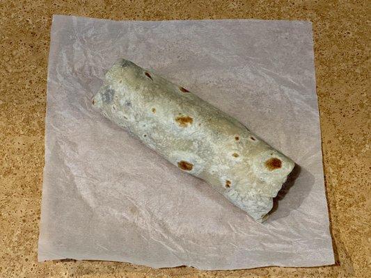 Barbacoa Burrito (beef barbacoa, refried beans, minced onions, & cilantro)