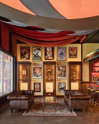 Flying Guillotine bar seating area with martial arts memorabilia