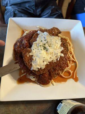 Chicken Parm over pasta it was absolutely delicious and huge portions