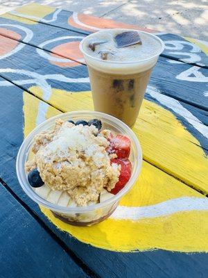 Cold brew with oat milk & mexican spices and acai bowl with housemade peanut butter