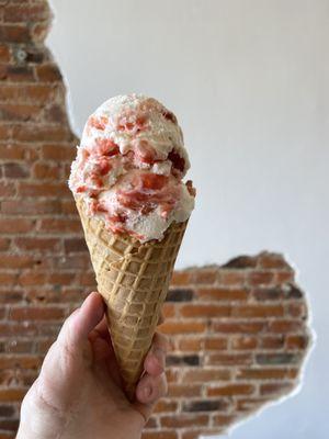 Oh my Strawberry Cheesecake ice cream in a waffle cone.