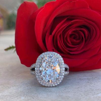 Large oval diamond engagement ring. Custom jewelry design.