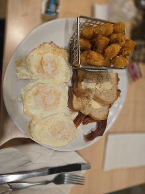 3 eggs and bacon with tater tots and 1 slice toast.