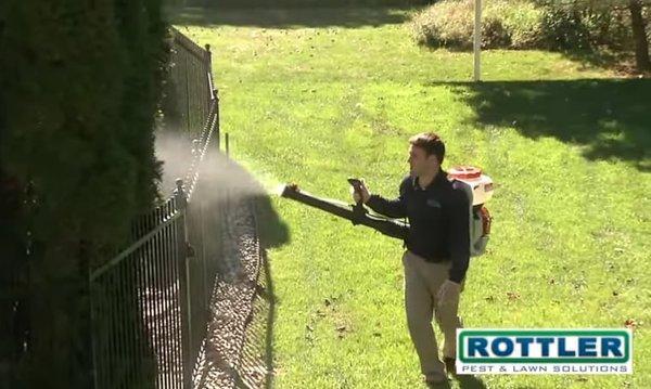 Rottler technician conducting a mosquito misting treatment