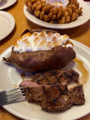 6oz sirloin, loaded sweet potato, and cactus blossom