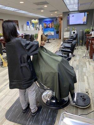 Son getting his 5 year old hair cut