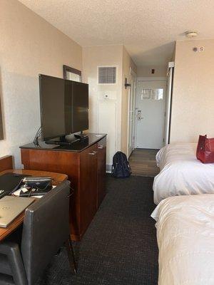 Credenza had mini fridge and coffee maker inside cabinet