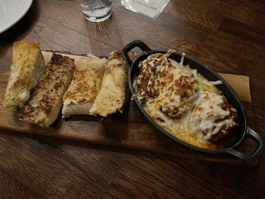 Meatball appetizer--sauce is different--maybe chipotle in it? One liked it. One didn't, one thought it was ok. Garlic bread was good