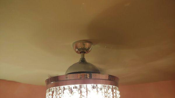 Flush with a perfect cut hole for the ceiling fan