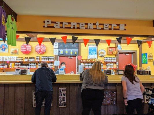 Placing orders for pre-packed cider doughnuts and cider (or cider slushies).