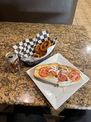 Cheese Steak hoagie with onion rings