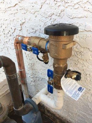 Sprinkler back flow preventer replacement.