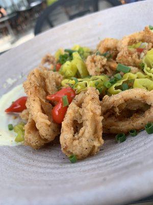 Fried calamari with tomatoes and banana peppers.