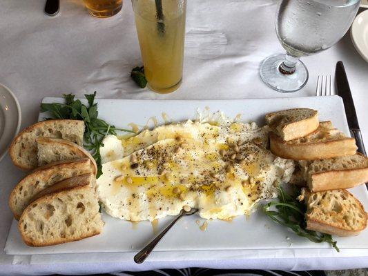 Must have House made Ricotta with honey , pine nuts, cracked black pepper, arugula and crostini.