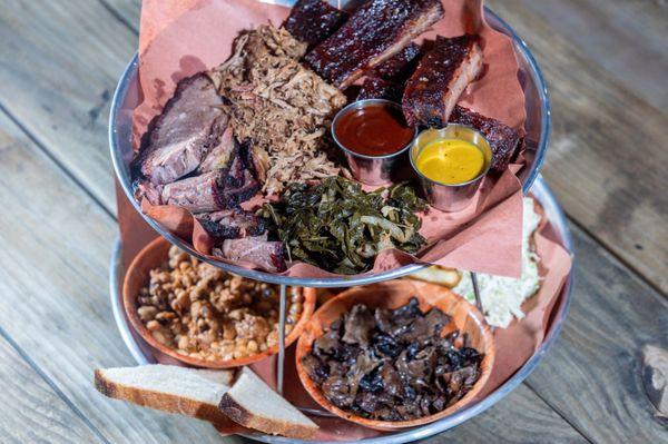 Craft Hall's Almost-Famous BBQ tower comes with your pick of 3 meats and sides