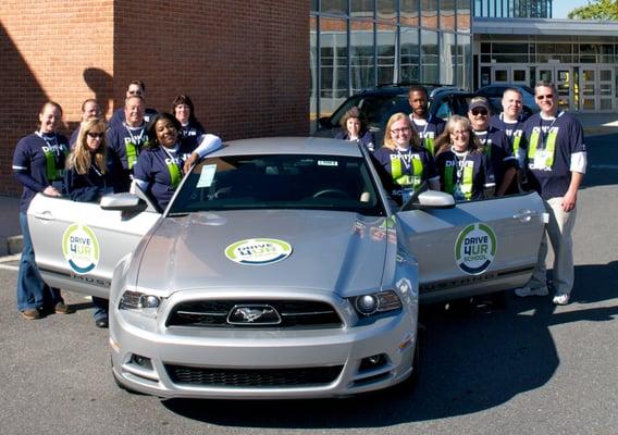 Academy Ford staff volunteers at the Drive 4 UR School event benefiting St. Vincent Pallotti High School