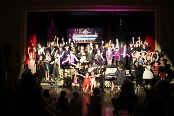 The final scene of one of our original musicals put on by our Elementary students each year. This was "The History of Chicago"