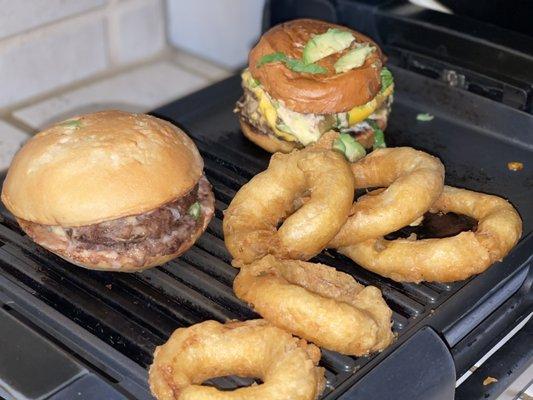 Umami double cheeseburger, Umami double truffle burger and Onion rings